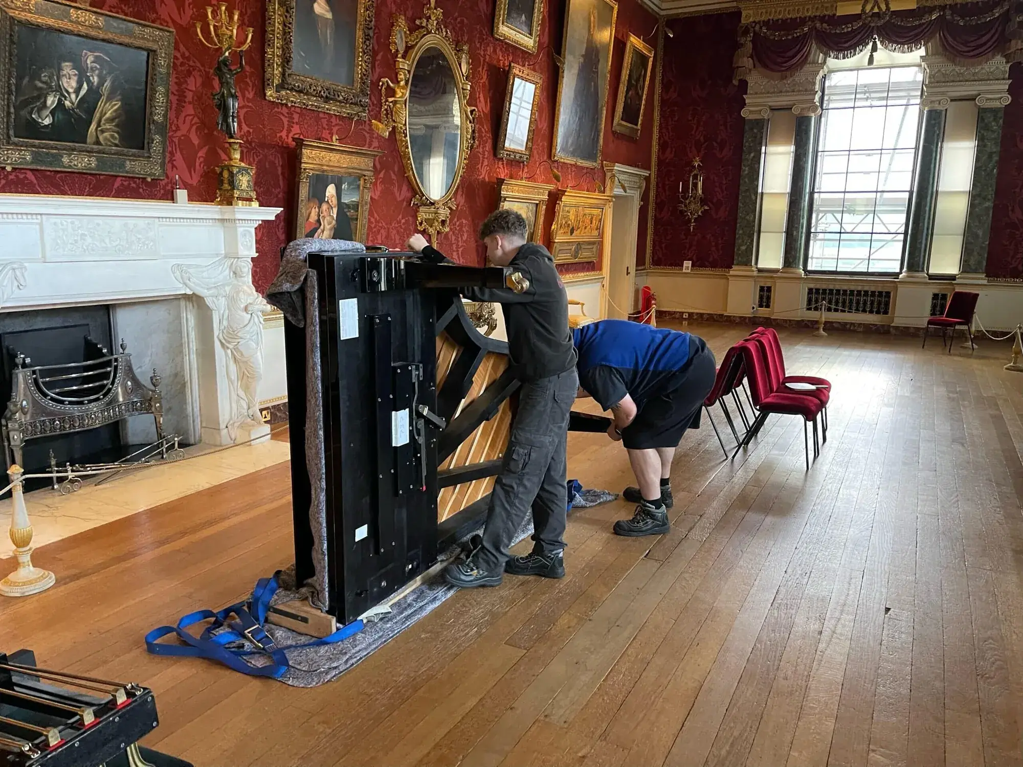 Yorkshire Piano Logistics crew moving a piano